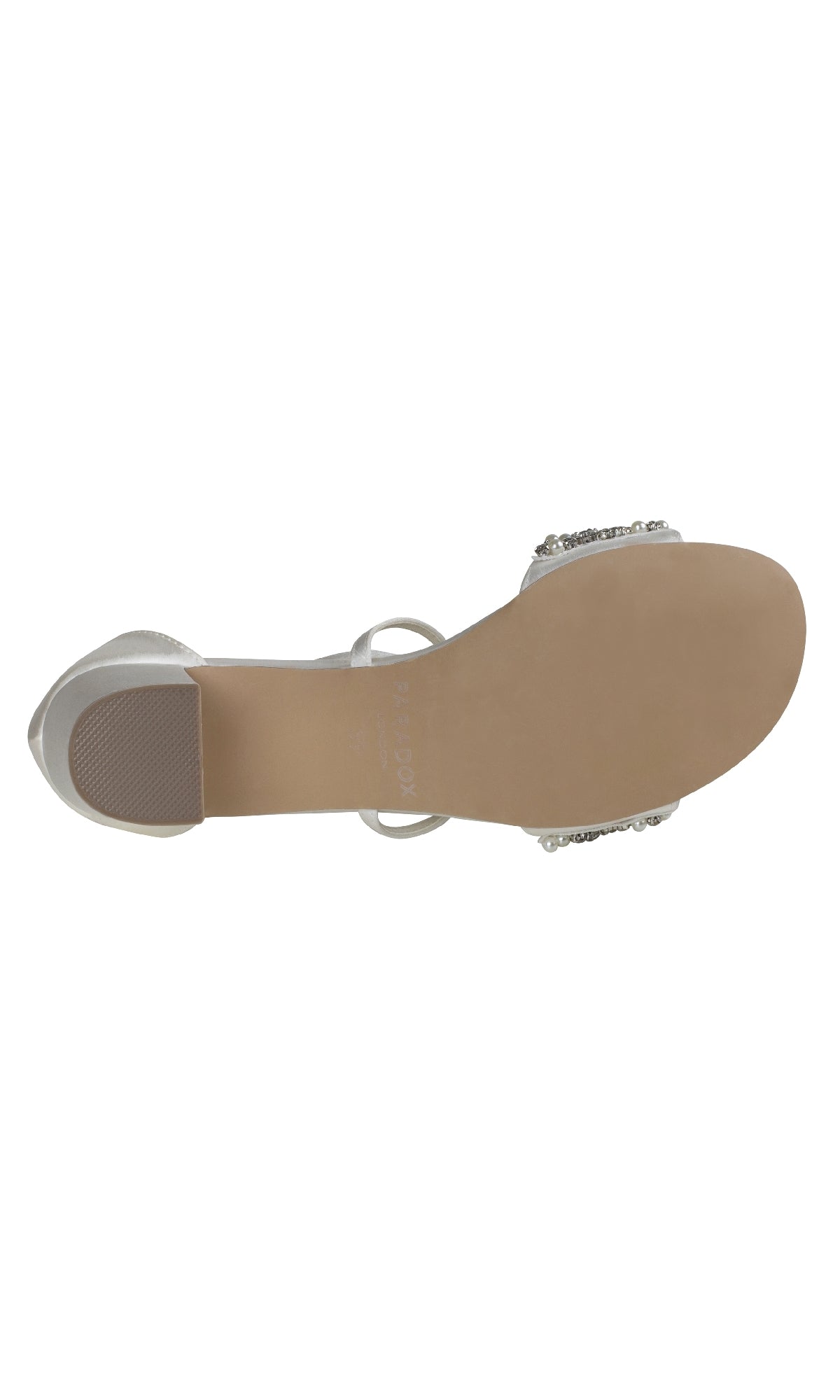 A top-down view of the Evangeline Ivory Satin Prom Shoe (Paradox London P2200) reveals its flat, beige sole and elegant strap—an inspired, low-heel formal option.